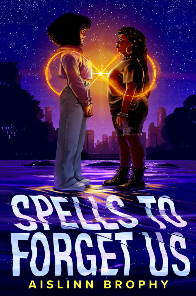 The cover for Spells to Forget Us by Aislinn Brophy. The cover shows two Black girls, one with lighter skin and fluffy curly hair, and the other with darker skin, locs, and an all black outfit. They stand on a river looking at each other, with their hearts connected with a beam of orange light. The orange light sweeps around them in an infinity symbol. Behind them is a dark, starry sky and the Boston skyline. A dark silhouette of a dragon swims in the water in the distance. 